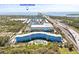 Aerial view of a blue building near the water with highway access at 3315 58Th S Ave # 309, St Petersburg, FL 33712