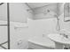 Clean bathroom with a bathtub, shower, and updated sink vanity at 3315 58Th S Ave # 309, St Petersburg, FL 33712