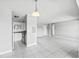 Kitchen features white cabinets and stainless steel appliances at 3315 58Th S Ave # 309, St Petersburg, FL 33712