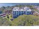 Aerial view of building showcasing its architecture and landscaping at 2699 Seville Blvd # 303, Clearwater, FL 33764