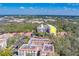 Aerial view of building and surrounding neighborhood at 2699 Seville Blvd # 303, Clearwater, FL 33764