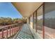 Private balcony overlooks lush landscape and parking at 2699 Seville Blvd # 303, Clearwater, FL 33764