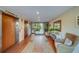 Elegant building lobby with comfortable seating and tile floors at 2699 Seville Blvd # 303, Clearwater, FL 33764