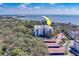 Aerial view of a condo building near the water at 2699 Seville Blvd # 303, Clearwater, FL 33764