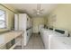 Convenient community laundry room with multiple washers and dryers at 345 S Mcmullen Booth Rd # 142, Clearwater, FL 33759