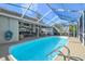 Relaxing screened-in pool area at 4936 Musselshell Dr, New Port Richey, FL 34655