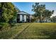 Condo building nestled in a lush, grassy area at 3455 Countryside Blvd # 52, Clearwater, FL 33761