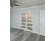 Bright bedroom closet with double doors and frosted glass at 330 Promenade Dr # 312, Dunedin, FL 34698