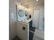 Bathroom with frameless shower and gray penny round floor at 330 Promenade Dr # 312, Dunedin, FL 34698