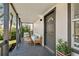 Inviting front porch features comfortable seating and potted plants at 1106 W La Salle St, Tampa, FL 33607