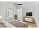 Spacious bedroom with light walls, hardwood floors, and ample closet space at 1106 W La Salle St, Tampa, FL 33607