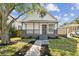 Charming renovated bungalow with a front porch and landscaped yard at 1106 W La Salle St, Tampa, FL 33607