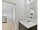 Modern bathroom with updated vanity and a large mirror at 1106 W La Salle St, Tampa, FL 33607