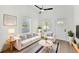 Cozy living room with hardwood floors and neutral decor at 1106 W La Salle St, Tampa, FL 33607