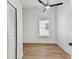 Charming bedroom featuring a window with blinds and wood floors at 1106 W La Salle St, Tampa, FL 33607