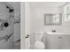 Modern bathroom with marble shower and white vanity at 4204 N Marguerite St, Tampa, FL 33603