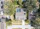 Aerial view showing house, pool, and neighborhood at 1214 Bolivar Ct, Dunedin, FL 34698