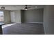 Bright living room features wood-look floors and neutral walls at 5623 80Th St N # 510, St Petersburg, FL 33709