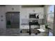 Modern kitchen with stainless steel appliances and granite countertops at 5623 80Th St N # 510, St Petersburg, FL 33709
