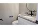 Modern bathroom with granite countertop, black faucet, and frameless shower at 5623 80Th St N # 510, St Petersburg, FL 33709