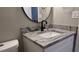 Bathroom with granite countertop and modern vanity at 5623 80Th St N # 510, St Petersburg, FL 33709