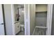 Bathroom with granite vanity, frameless shower, and walk-in closet at 5623 80Th St N # 510, St Petersburg, FL 33709