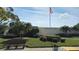 Magnolia Sun Center building with landscaping and a bench at 5623 80Th St N # 510, St Petersburg, FL 33709