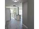 Modern kitchen with granite countertops and white cabinets at 5623 80Th St N # 510, St Petersburg, FL 33709