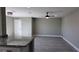 Spacious living room with wood-look floors and ceiling fan at 5623 80Th St N # 510, St Petersburg, FL 33709