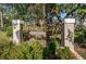 Ornate entrance gate to Brooker Creek Villas and Townhomes community at 4399 Brooker Creek Dr, Palm Harbor, FL 34685