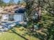 Aerial view of a charming townhouse with a two-car garage at 4399 Brooker Creek Dr, Palm Harbor, FL 34685