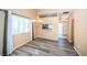 Dining room featuring wood-look floors and a chandelier at 4399 Brooker Creek Dr, Palm Harbor, FL 34685
