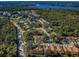 Aerial view of community and surrounding landscape at 4399 Brooker Creek Dr, Palm Harbor, FL 34685