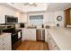 Well-equipped kitchen featuring stainless steel appliances at 6575 99Th N Way # 22201, St Petersburg, FL 33708