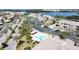 Community overview showcasing homes, landscaping, and waterfront access at 6575 99Th N Way # 22201, St Petersburg, FL 33708