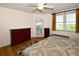 Bedroom with a queen bed, dresser, and access to a private balcony overlooking the water at 6575 99Th N Way # 22201, St Petersburg, FL 33708