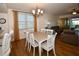 Bright dining room featuring a table with seating for six at 6575 99Th N Way # 22201, St Petersburg, FL 33708
