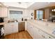 Modern kitchen with stainless steel appliances and ample counter space at 6575 99Th N Way # 22201, St Petersburg, FL 33708
