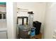Utility closet with water heater and water softener at 6575 99Th N Way # 22201, St Petersburg, FL 33708