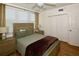 Bedroom with a full bed and a large closet at 6575 99Th N Way # 22201, St Petersburg, FL 33708
