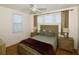 Bedroom with a full bed and nightstands at 6575 99Th N Way # 22201, St Petersburg, FL 33708