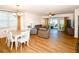Bright living room with dining area and access to a balcony at 6575 99Th N Way # 22201, St Petersburg, FL 33708