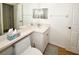Clean bathroom with a toilet and dual vanity at 6575 99Th N Way # 22201, St Petersburg, FL 33708