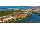 Aerial view of waterfront property with community pool at 1515 Pinellas Bayway S # B28, Tierra Verde, FL 33715
