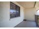 Exterior condo hallway view with door and window at 1515 Pinellas Bayway S # B28, Tierra Verde, FL 33715