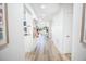 Light and bright hallway with wood-look flooring at 1515 Pinellas Bayway S # B28, Tierra Verde, FL 33715