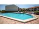 Relaxing community pool and hot tub area at 1515 Pinellas Bayway S # B28, Tierra Verde, FL 33715