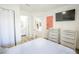 Bedroom with a queen bed and access to bathroom at 1515 Pinellas Bayway S # B28, Tierra Verde, FL 33715