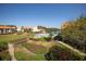 Aerial view of community pool and surrounding buildings at 1515 Pinellas Bayway S # B28, Tierra Verde, FL 33715