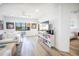 Bright living room with water views, comfy sofas and large TV at 1515 Pinellas Bayway S # B28, Tierra Verde, FL 33715